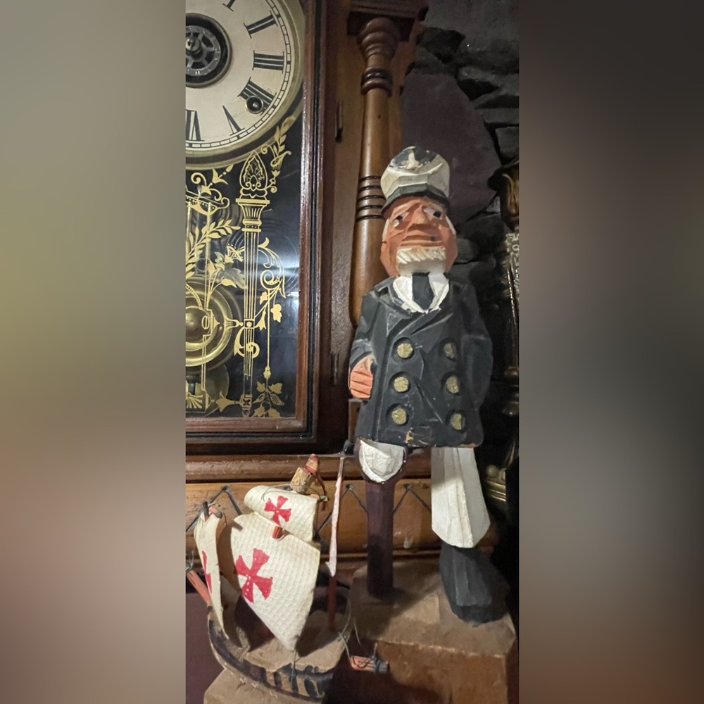 Hand carved sea captain and ship. GUC